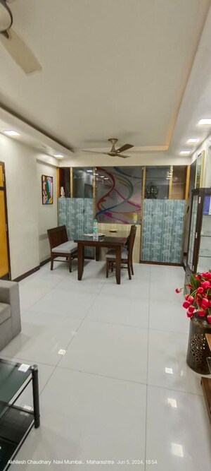 Living Room in 2 BHK Apartment at Abhiruchi CHS, Vashi Sector 12 – for Rent