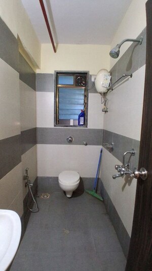 Bathroom in 2 BHK Apartment at DGS Sheetal Sati Smruti, Malad East – for Rent