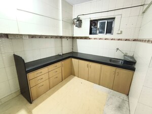 Kitchen in 1 BHK Apartment at Ashoka CHS, Vasant Vihar – for Rent