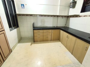 Kitchen in 1 BHK Apartment at Ashoka CHS, Vasant Vihar – for Rent