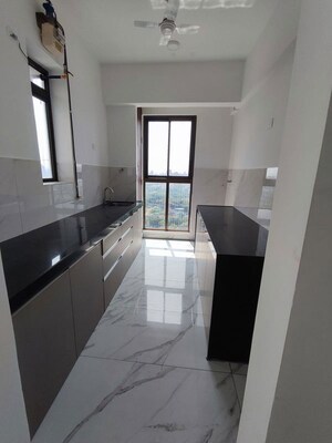 Kitchen in 2 BHK Apartment at Raymond Realty Phase II, Pokhran Road No Two – for Rent