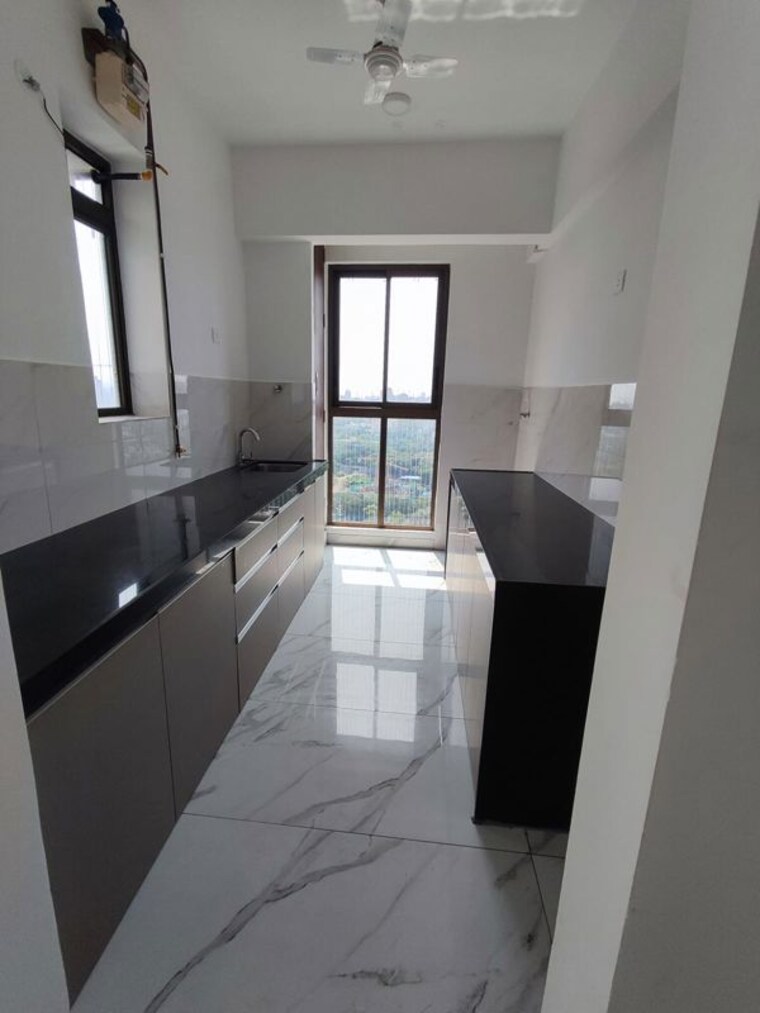 Kitchen, raymond-realty-phase-ii 2 Bedroom 675 Sq.Ft. Apartment In Pokhran Road No Two Thane 10408084