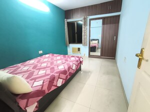 Bedroom in 2 BHK Apartment at Eversmile Jasmine Towers, Vasant Vihar – for Rent