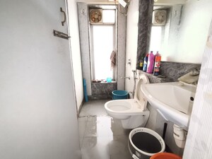 Bathroom in 2 BHK Apartment at Eversmile Jasmine Towers, Vasant Vihar – for Rent