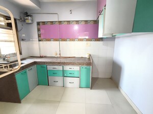 Kitchen in 2 BHK Apartment at Kanakia Spaces Niharika, Manpada – for Rent
