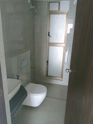 Bathroom in 2 BHK Apartment at Raymond Realty Phase II, Pokhran Road No Two – for Rent