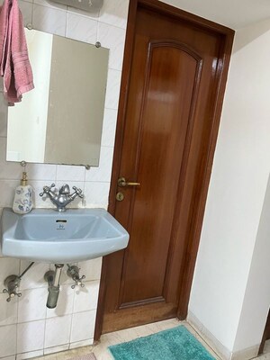 Bathroom in 2 BHK Apartment at Minal Apartments, Andheri East – for Rent