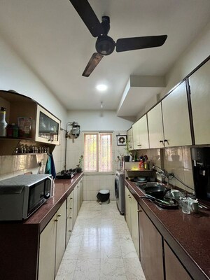Kitchen in 2 BHK Apartment at Minal Apartments, Andheri East – for Rent