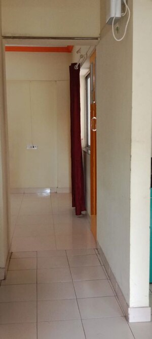 Bathroom in 2 BHK Apartment at Sai Dham CHS, Dhanori – for Rent
