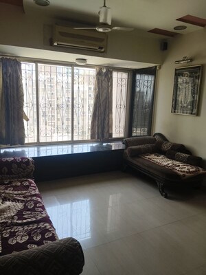 Living Room in 1 BHK Apartment at Shree Vallabh Apartment Malad, Malad West – for Rent