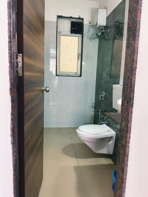 Bathroom in 2 BHK Apartment at Newa Bhakti Park, T.T.C. Industrial Area – for Rent