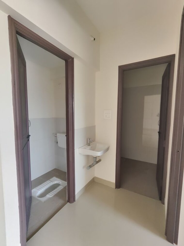 Washroom, magarpatta-riverview-city 1 Bedroom 700 Sq.Ft. Apartment In Loni Kalbhor Pune 10408235