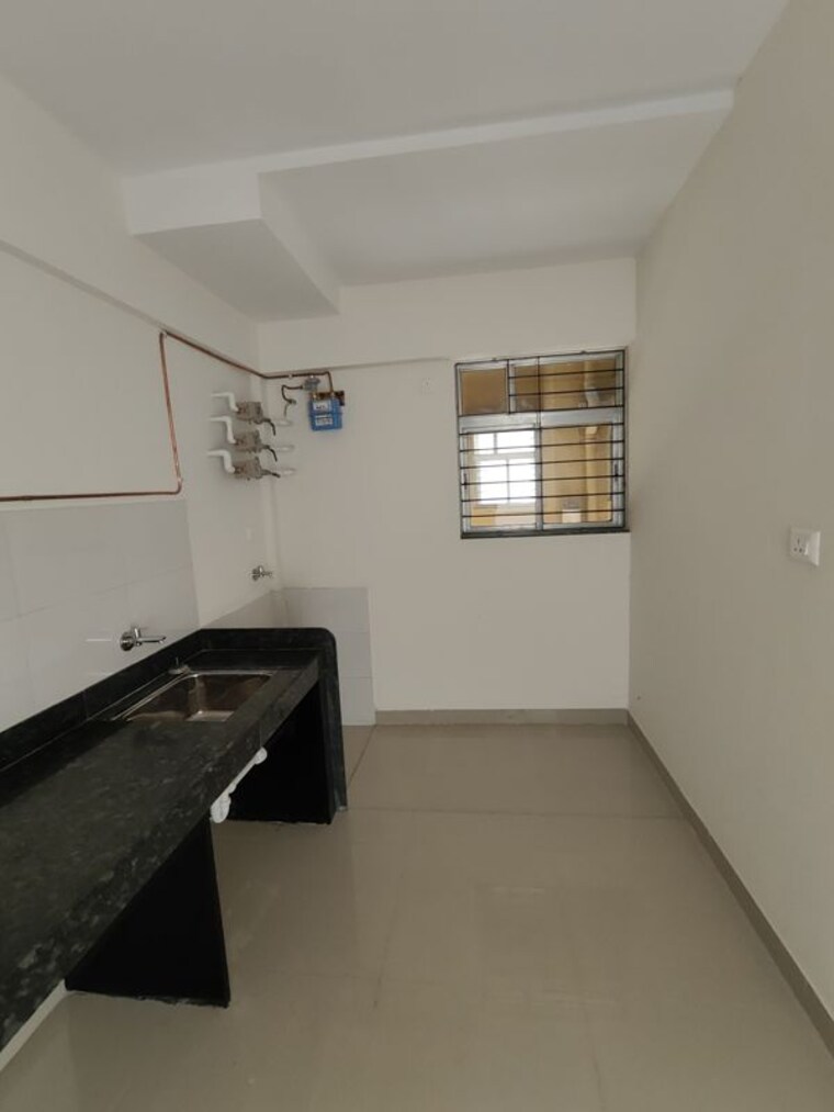 Kitchen, magarpatta-riverview-city 1 Bedroom 700 Sq.Ft. Apartment In Loni Kalbhor Pune 10408235