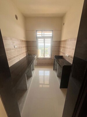 Kitchen in 1.5 BHK Apartment at Sheth Avante, Kanjurmarg West – for Rent