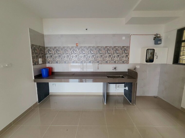 Kitchen, magarpatta-riverview-city 2 Bedroom 1000 Sq.Ft. Apartment In Loni Kalbhor Pune 10408252