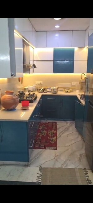 Kitchen in 3 BHK Apartment at Surya CGHS Apartment, Sector 21d – for Sale
