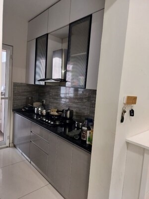 Kitchen in 2.5 BHK Apartment at Puri Emerald Bay, Sector 104 – for Rent