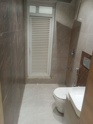 Bathroom in 1 BHK Apartment at Ruparel Urbana, Kurla – for Sale