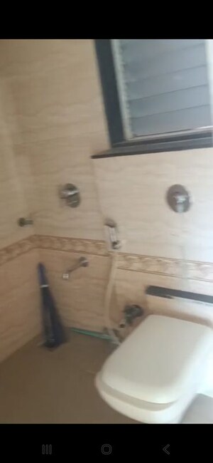 Bathroom in 2 BHK Apartment at Manav Kalyan, Goregaon West – for Rent