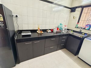 Kitchen in 2 BHK Apartment at Serenity Heights, Malad West – for Rent