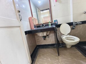 Kitchen in 2 BHK Apartment at Serenity Heights, Malad West – for Rent
