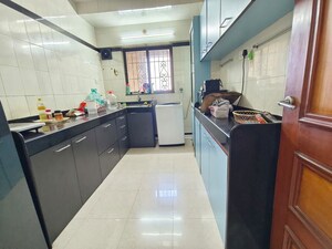 Kitchen in 2 BHK Apartment at Serenity Heights, Malad West – for Rent