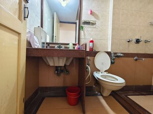 Bathroom in 2 BHK Apartment at Serenity Heights, Malad West – for Rent