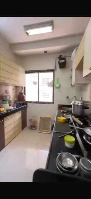 Kitchen in 1 BHK Apartment at Agarwal Nimit Tower, Kandivali West – for Rent