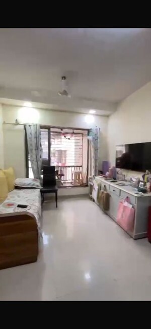 Living Room in 1 BHK Apartment at Agarwal Nimit Tower, Kandivali West – for Rent