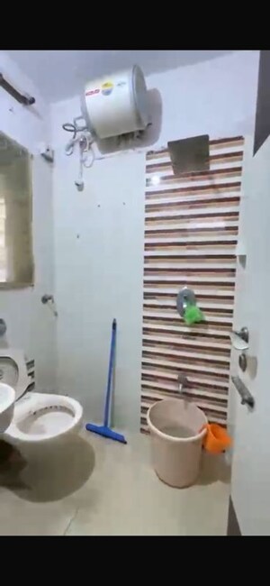 Bathroom in 1 BHK Apartment at Agarwal Nimit Tower, Kandivali West – for Sale