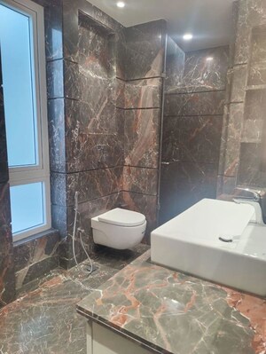 Bathroom in 4 BHK Builder Floor at Defence Colony – for Rent
