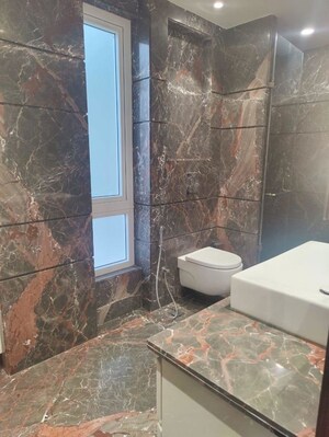 Bathroom in 4 BHK Builder Floor at Defence Colony – for Rent