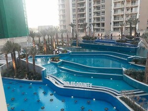 Swimming Pool in 3.5 BHK Apartment at ABA Cleo County, Sector 121 – for Rent