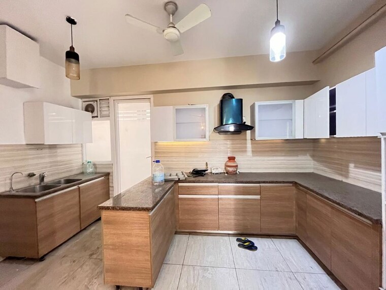 Kitchen, aba-cleo-county 3 Bedroom 1827 Sq.Ft. Apartment In Sector 121 Noida 10408423