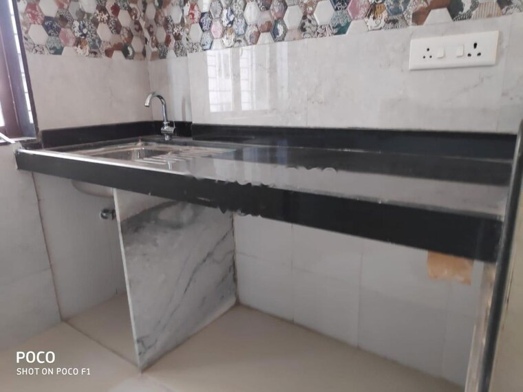 Kitchen, uk-iridium 2 Bedroom 860 Sq.Ft. Apartment In Kandivali East Mumbai 10408453