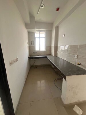 Kitchen in 2.5 BHK Apartment at Ajnara Homes, Sector 16b Greater Noida – for Sale