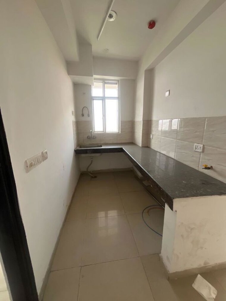Kitchen, ajnara-homes 2.5 Bedroom 1085 Sq.Ft. Apartment In Sector 16b Greater Noida Greater Noida 10408455