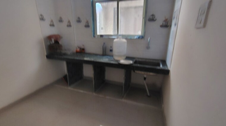 Kitchen, ajmeri-sara-complex 1 Bedroom 629 Sq.Ft. Apartment In Kalher Thane 10408549