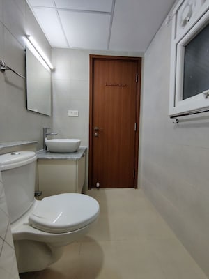 Bathroom in  Apartment at Bhartiya Nikoo Homes Phase 2, Thanisandra Main Road – for Rent