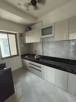 Kitchen in 2 BHK Apartment at Sheth Auris Bliss, Malad West – for Rent