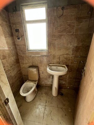 Bathroom in 1 BHK Apartment at Kingson ARV Arcade, Raj Nagar Extension – for Rent