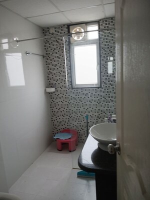 Bathroom in 2 BHK Apartment at Chandra Panorama, Sushant Golf City – for Rent