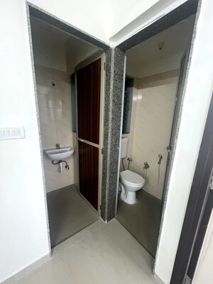 Building Lobby in 1 BHK Apartment at Satellite Garden, Goregaon East – for Rent