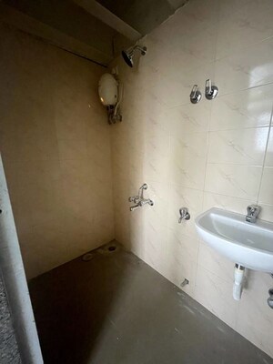 Bathroom in 1 BHK Apartment at Satellite Garden, Goregaon East – for Rent