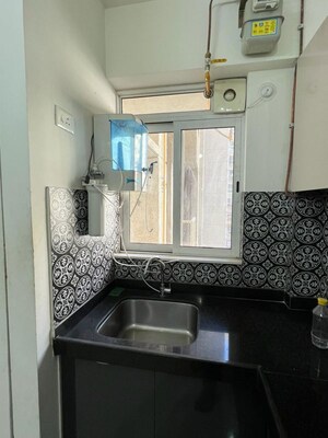 Kitchen in 2 BHK Apartment at Lodha Amara, Kolshet Road – for Rent