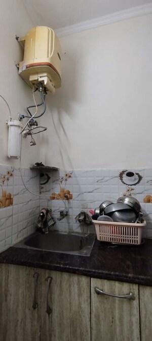 Bathroom in 2 BHK Builder Floor at Green Fields Colony – for Rent