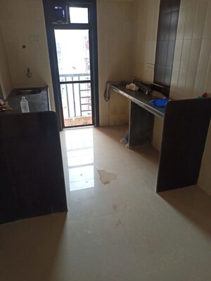 Kitchen in 2 BHK Apartment at Jai Sai Dham CHS, Borivali West – for Sale