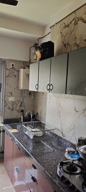 Kitchen in 2 BHK Apartment at Sunny Shanti Heights, Mulund West – for Rent