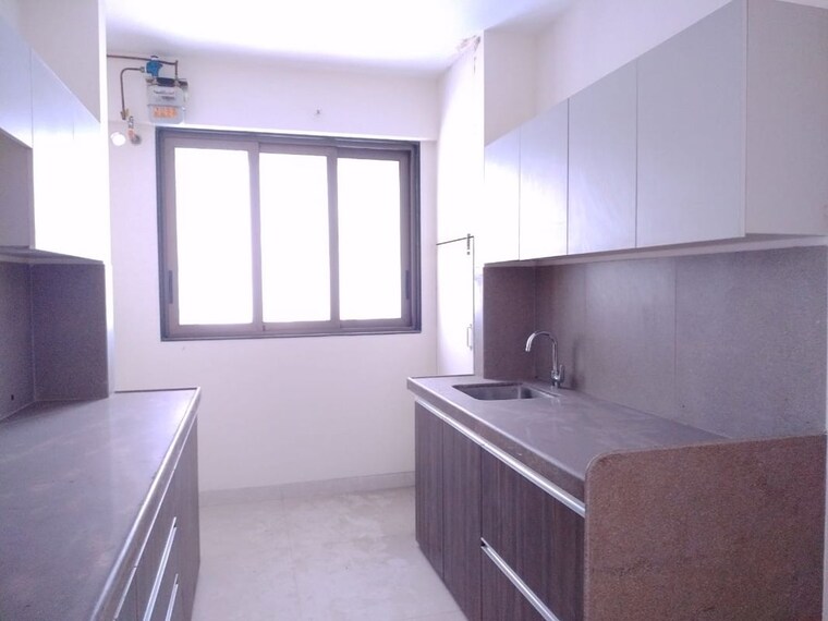 Kitchen, the-wadhwa-atmosphere 2 Bedroom 663 Sq.Ft. Apartment In Mulund West Mumbai 10408939