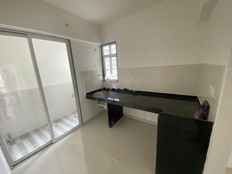 Kitchen, saheel-itrend-life-3 2 Bedroom 1014 Sq.Ft. Apartment In Wakad Pune 10408969